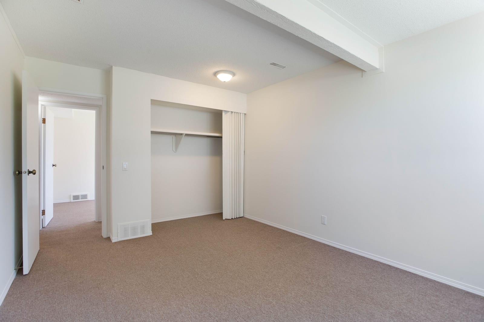 Unfurnished bedroom and closet