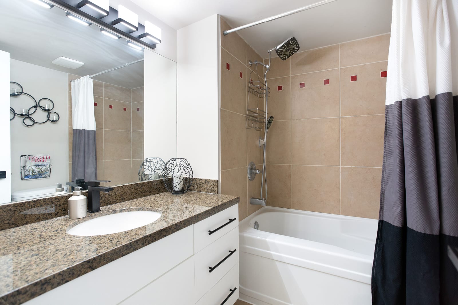 Main bathroom with tub and shower