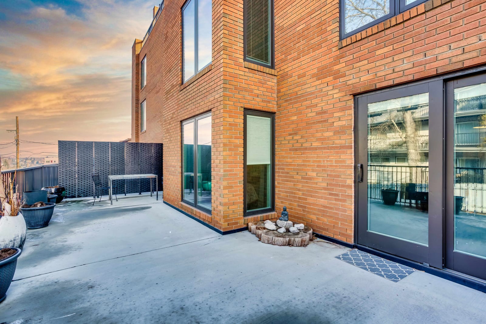 Terrace beside the brick exterior