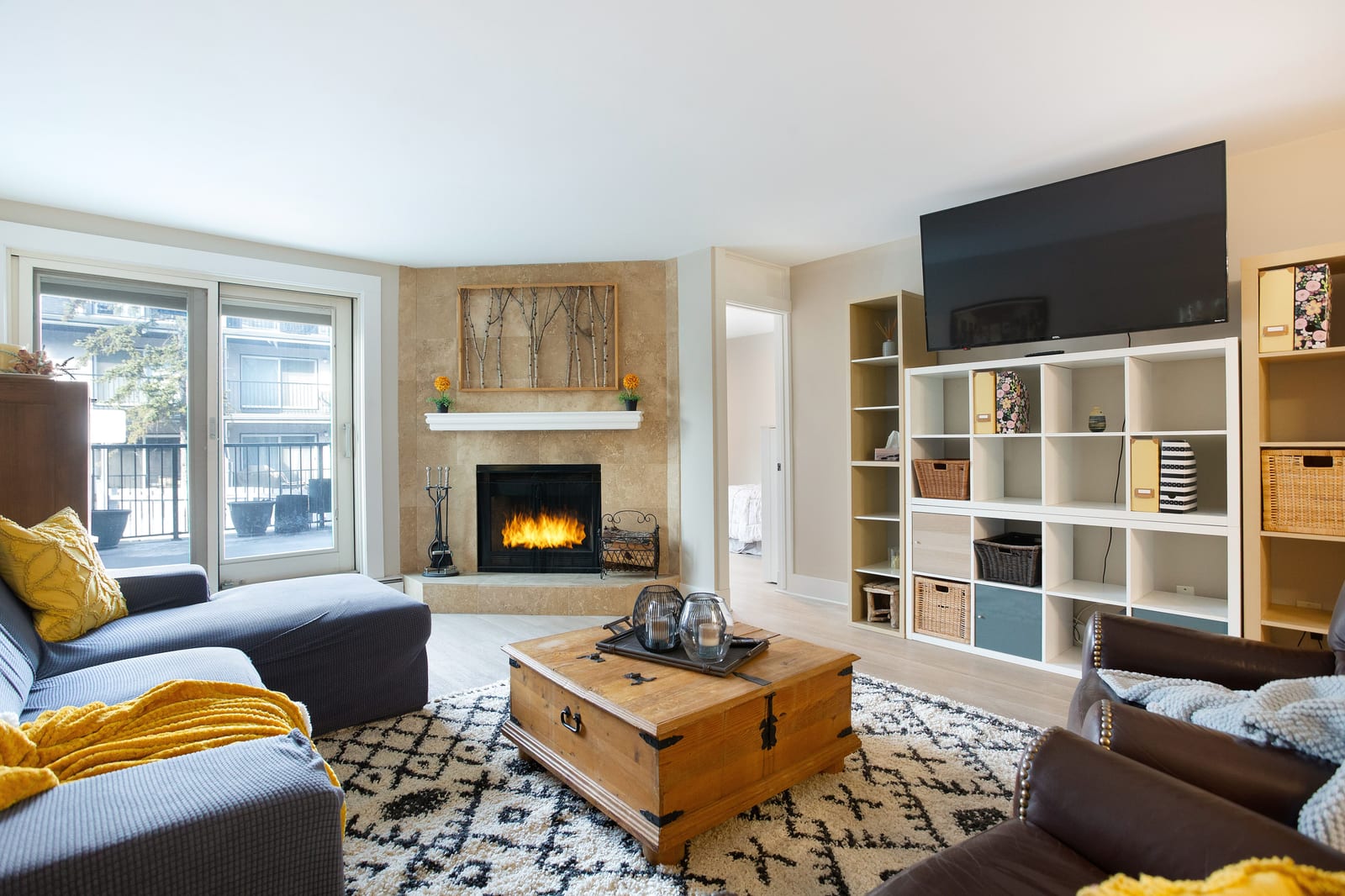 Fireplace and doors to the private terrace