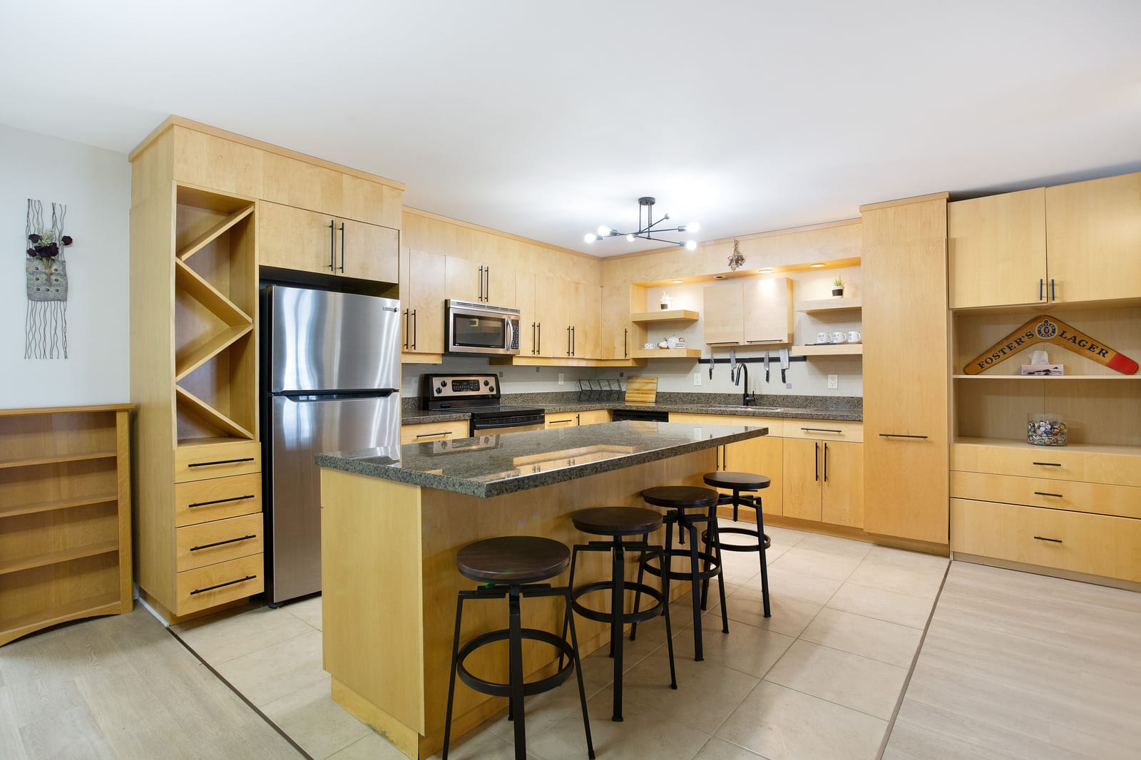 Granite island and stainless steel kitchen
