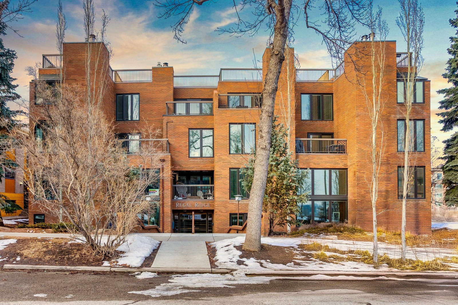 Brick condominium exterior in Crescent Heights