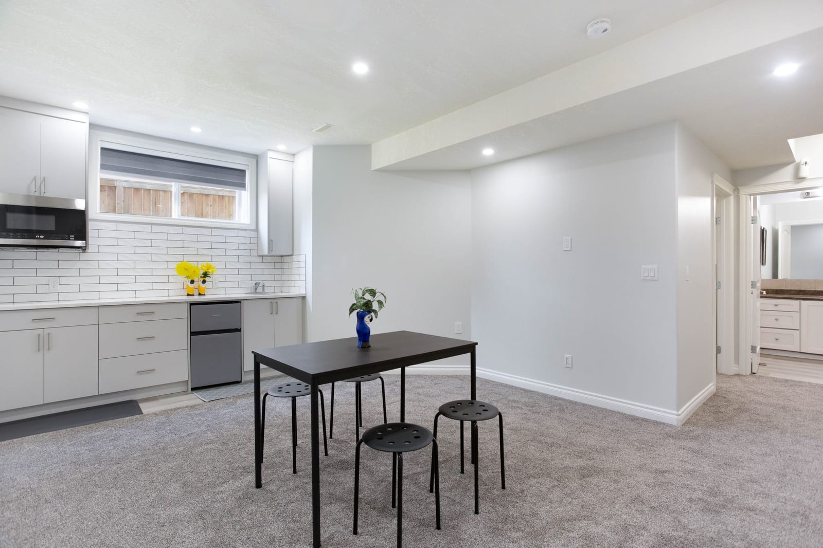 Lower-level gathering space and kitchenette