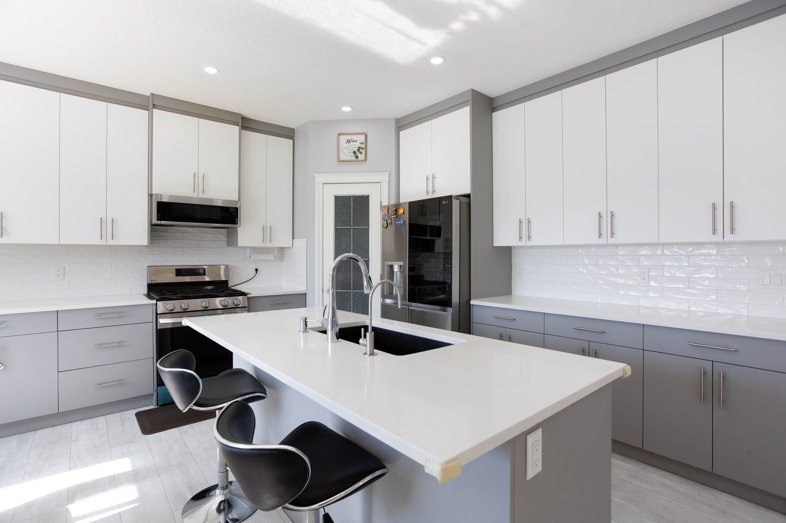 Kitchen island and white cabinetry