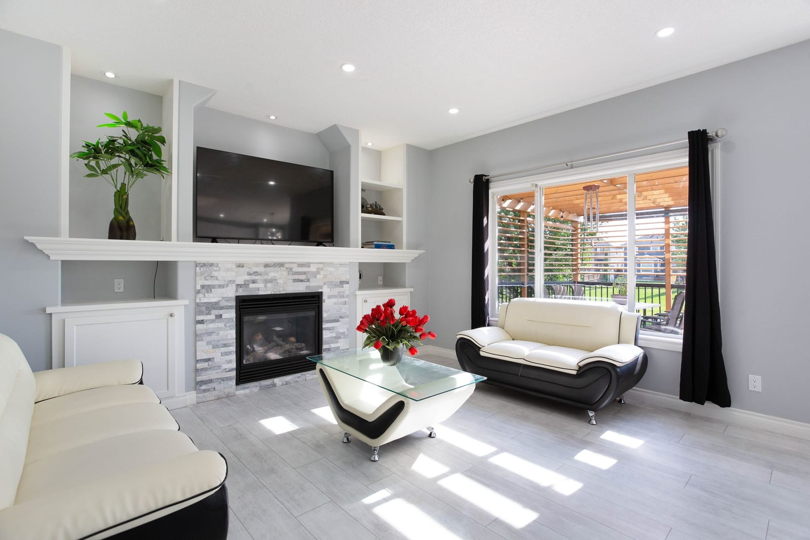 Fireplace and backyard-facing window