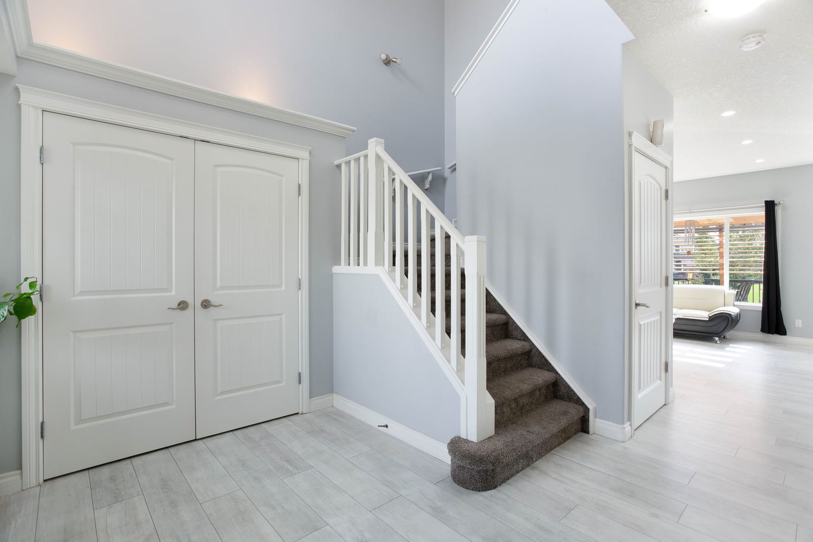 Front entry closet and staircase