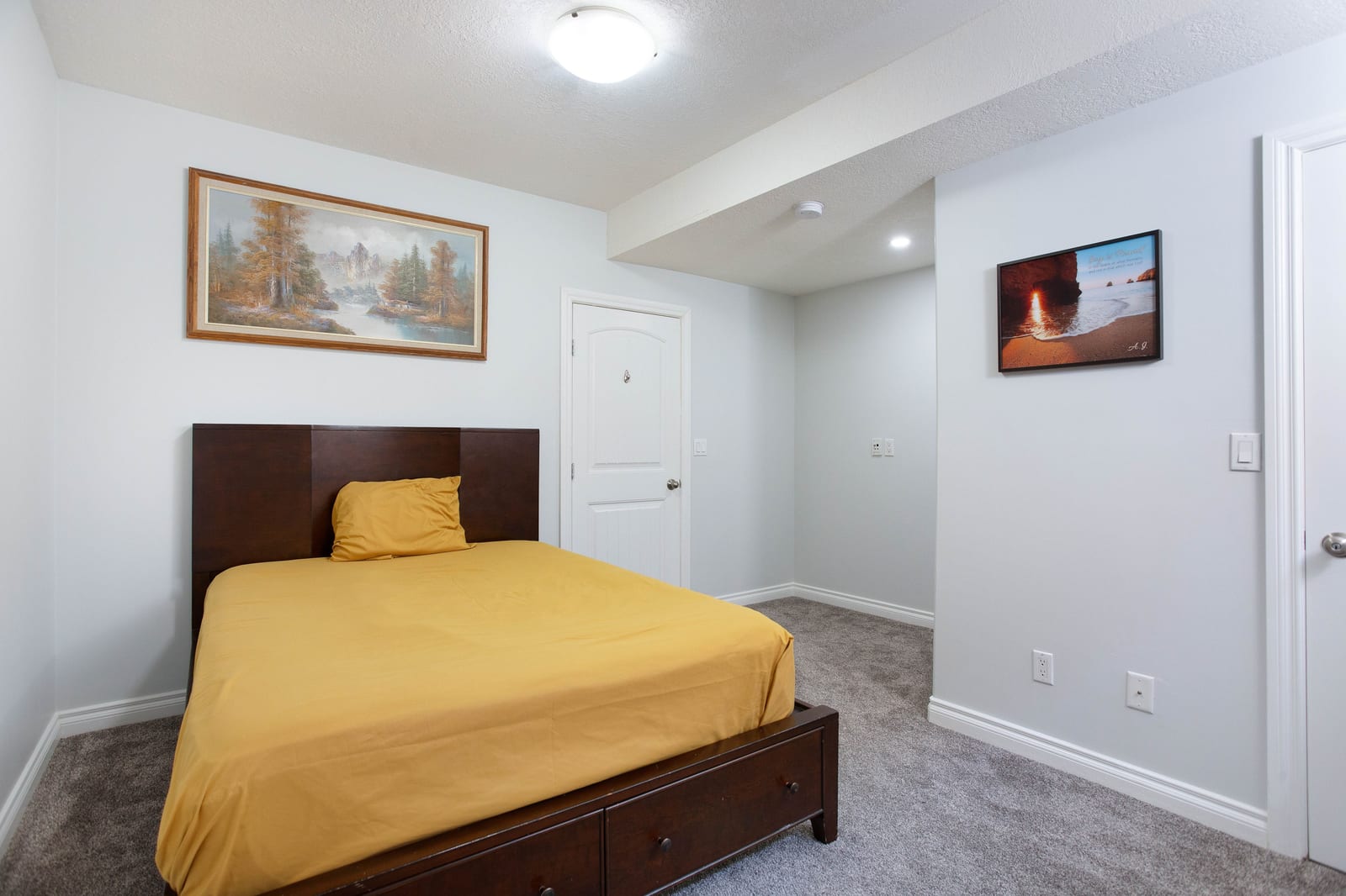Lower-level bedroom and hallway