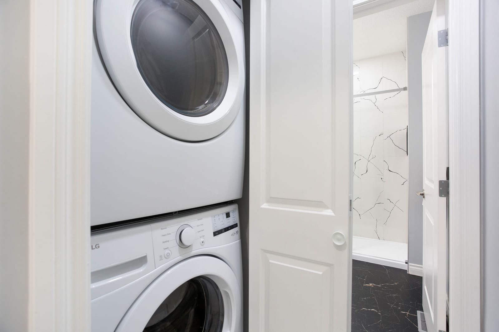 Stacked laundry appliances