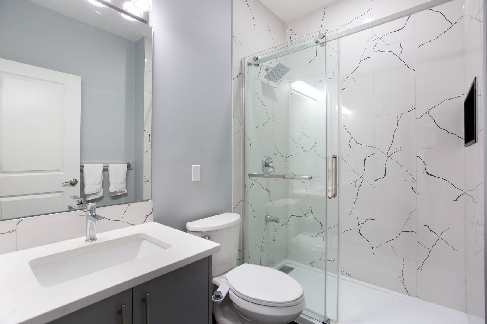 Main-floor bathroom with glass shower