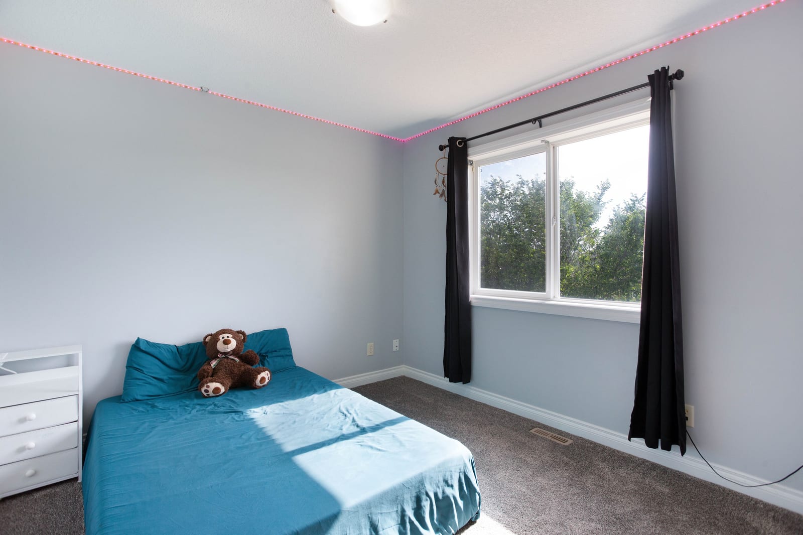 Bedroom with teal bedding