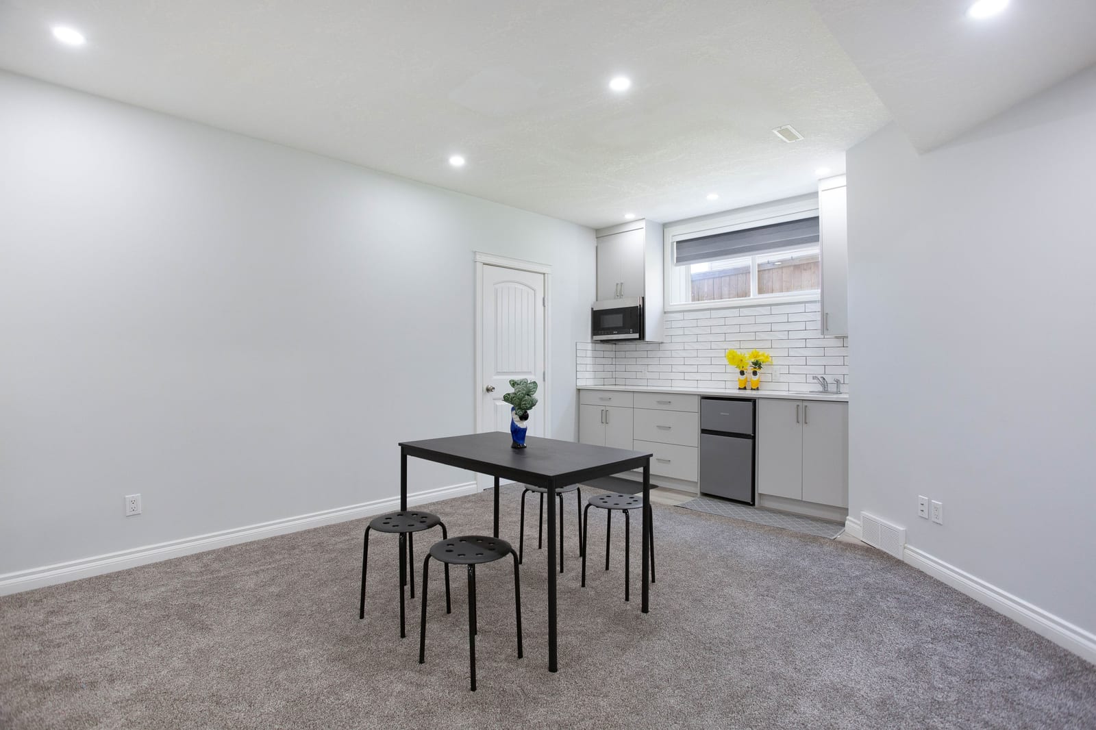 Lower-level kitchenette and dining area