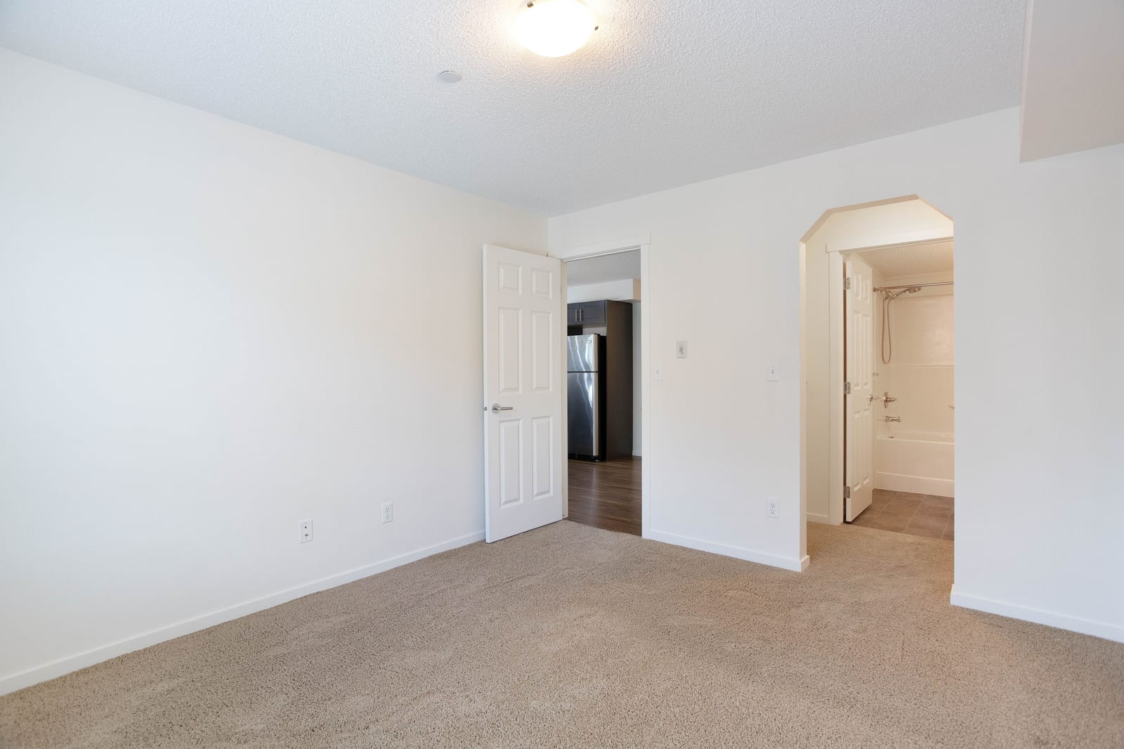 Primary bedroom and ensuite connection