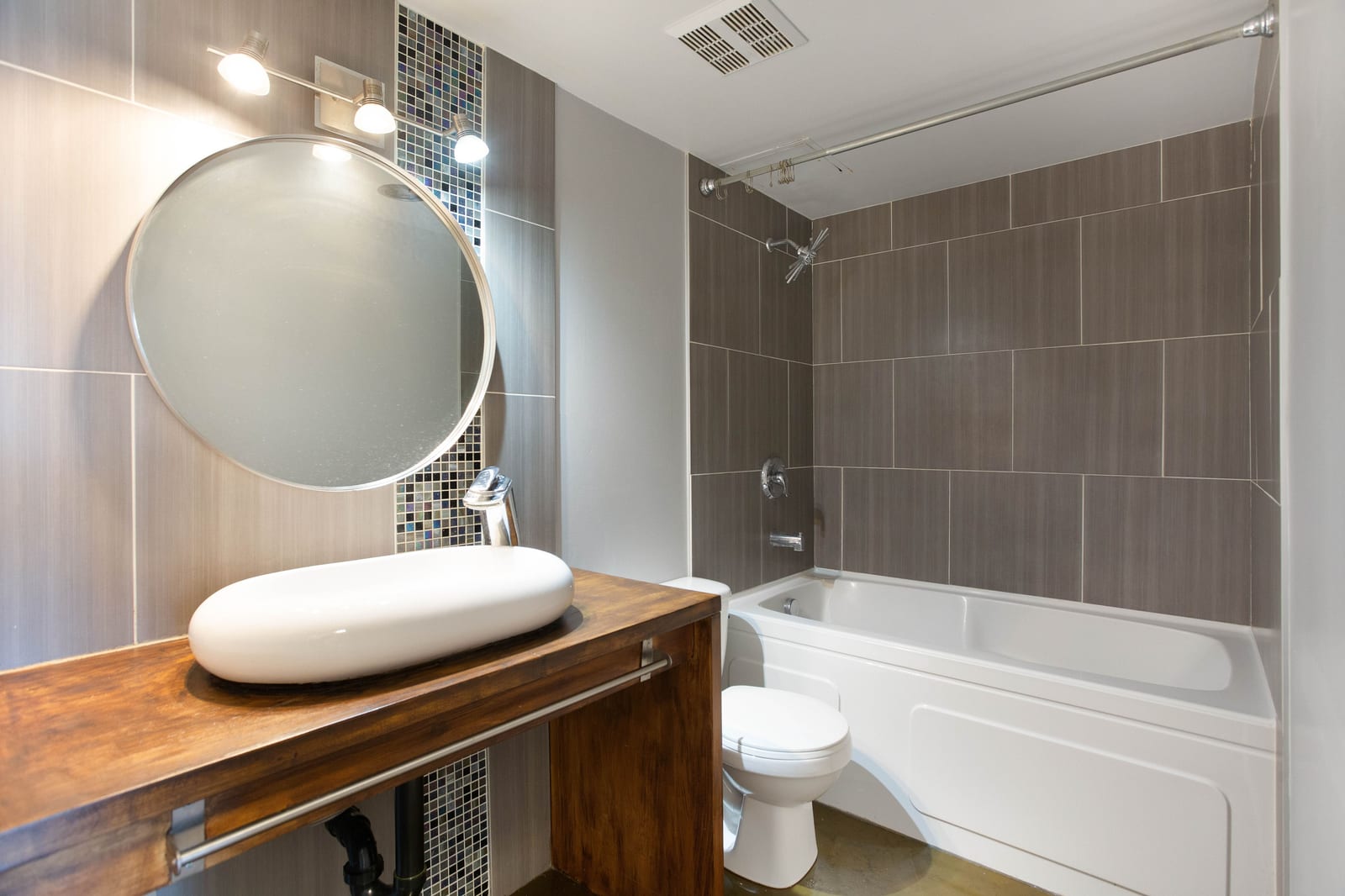 Bathroom vanity and bathtub