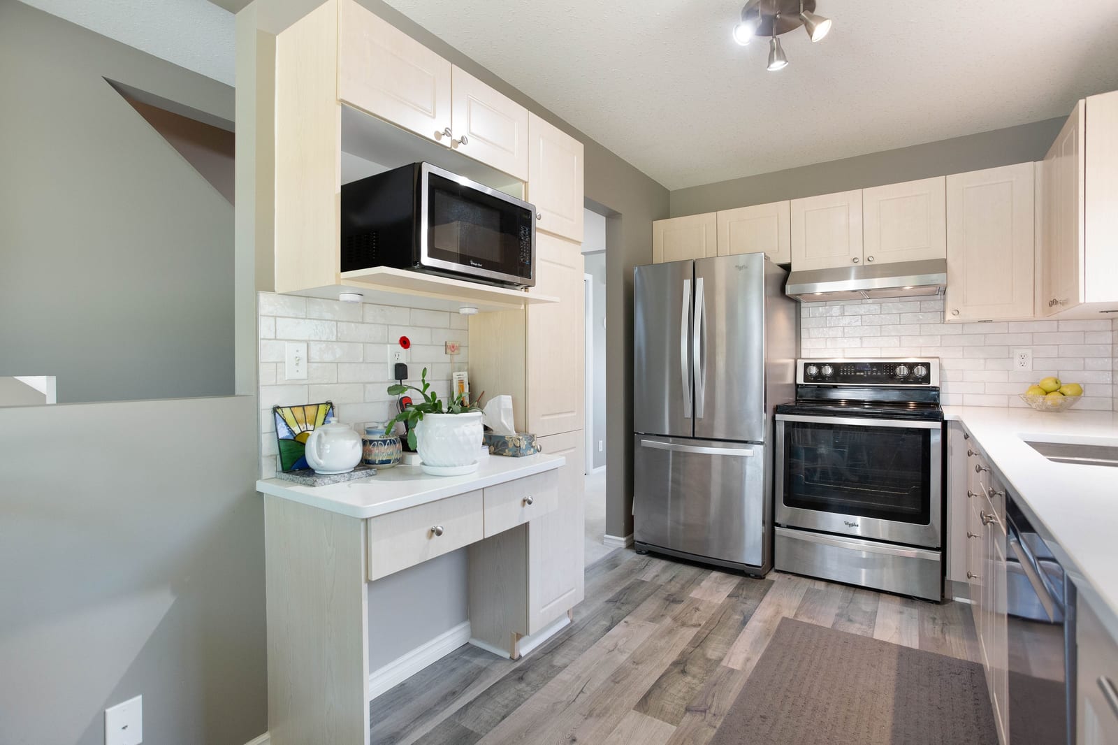 Kitchen cabinetry and stainless-steel appliances