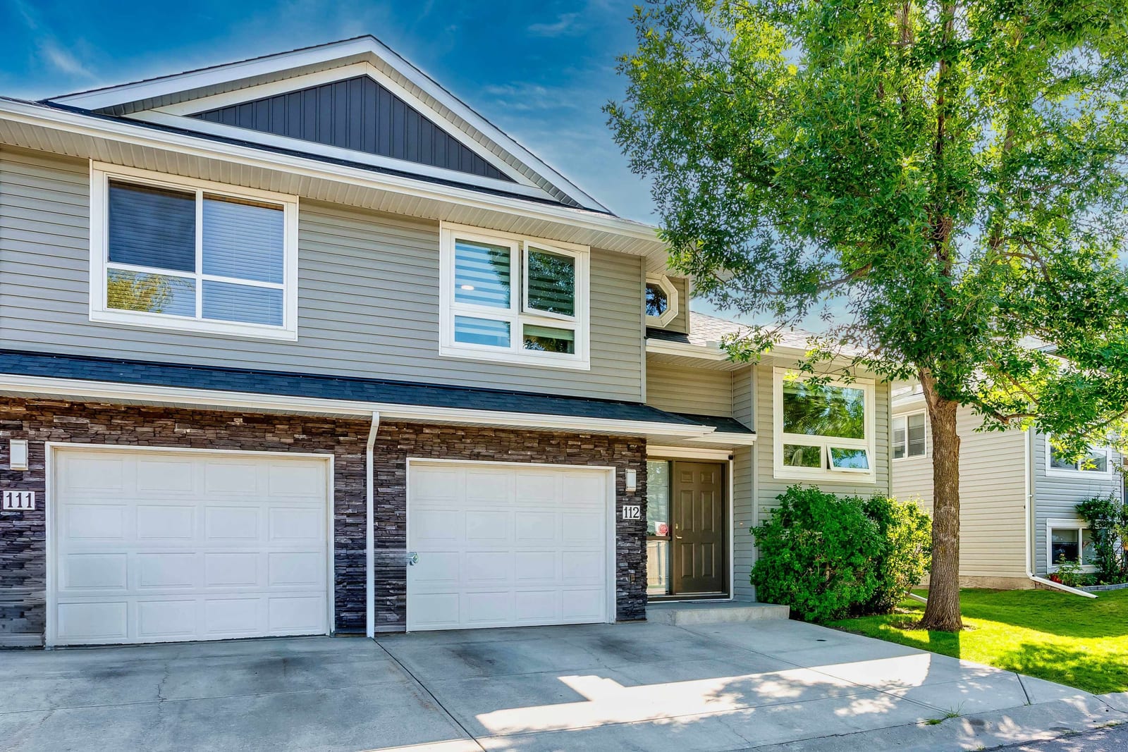 The single attached garage and front entrance