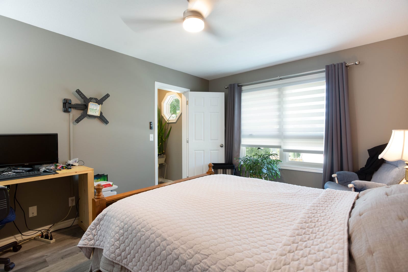 A bright primary bedroom outlook