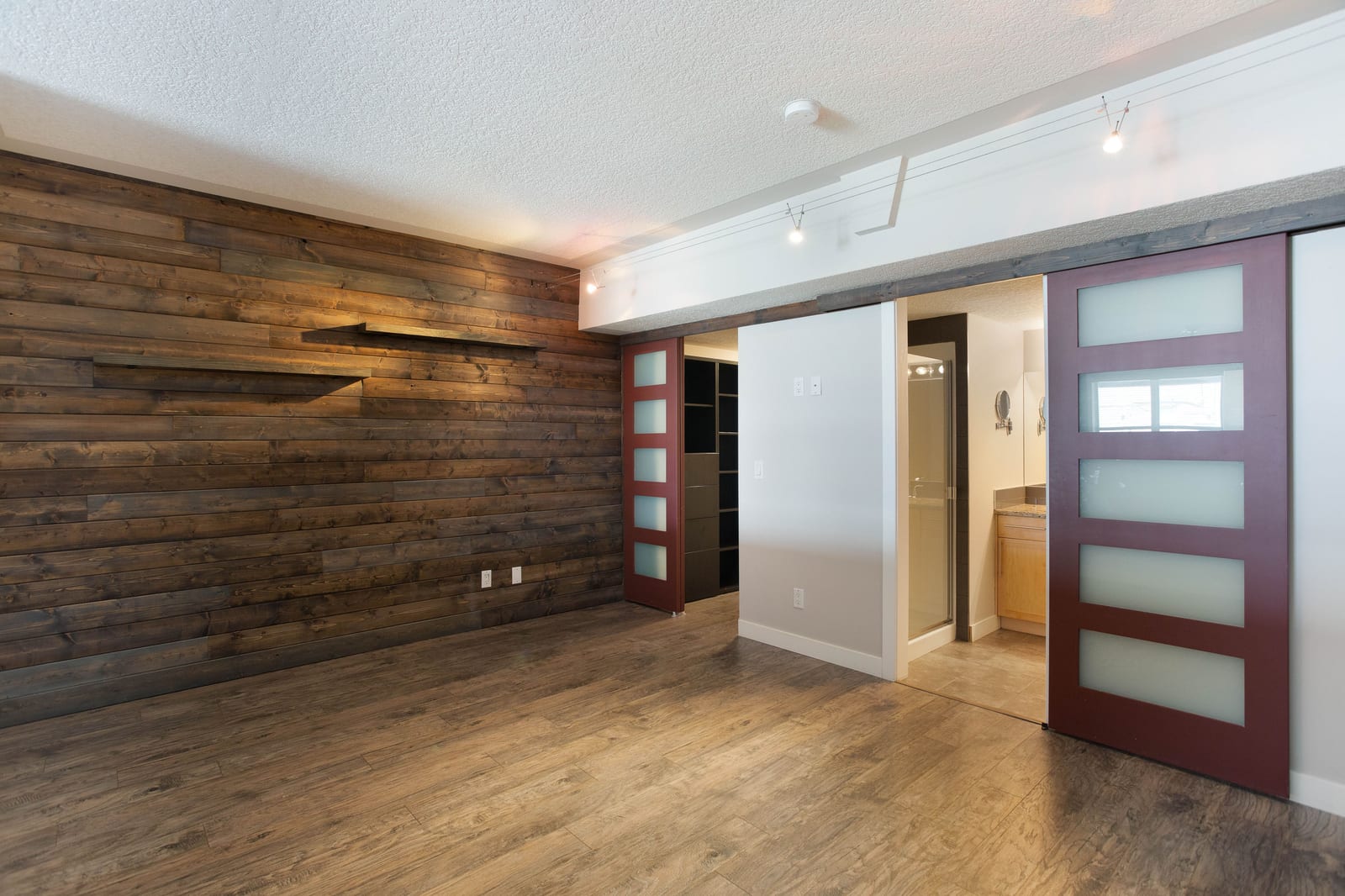 The loft bedroom's feature wall