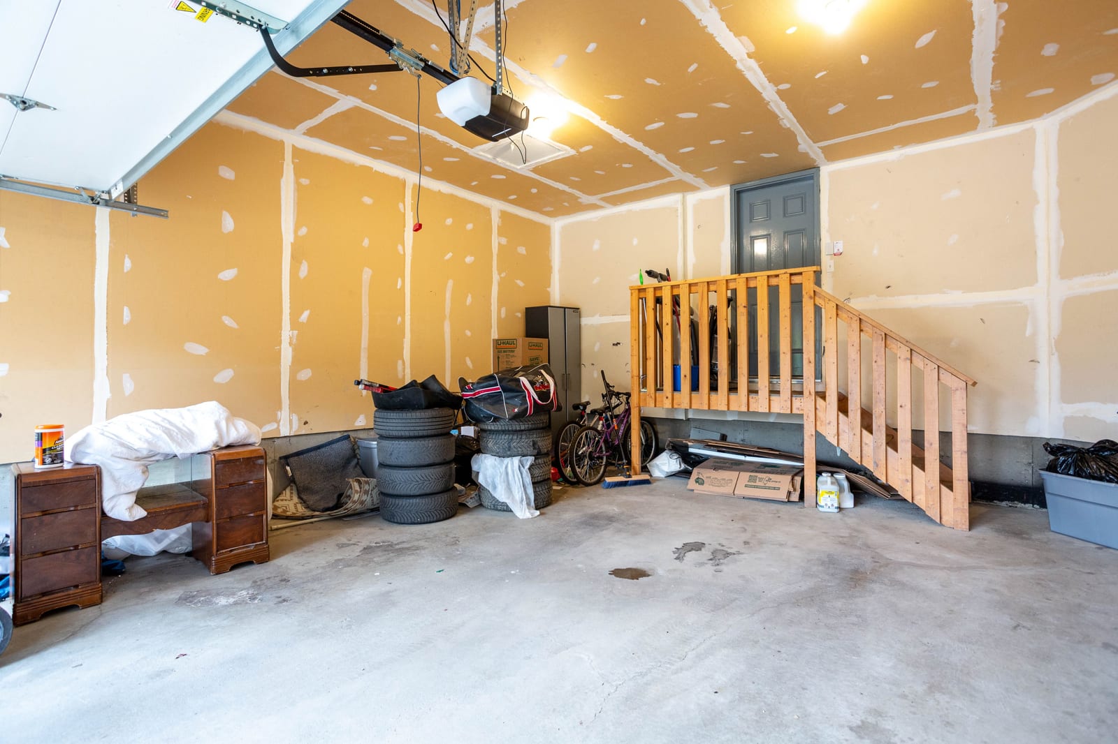 Interior of the attached double garage — 317 Ranch Ridge Meadow N, Strathmore