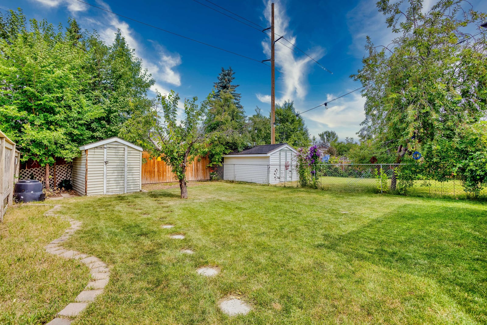 The wide fenced backyard