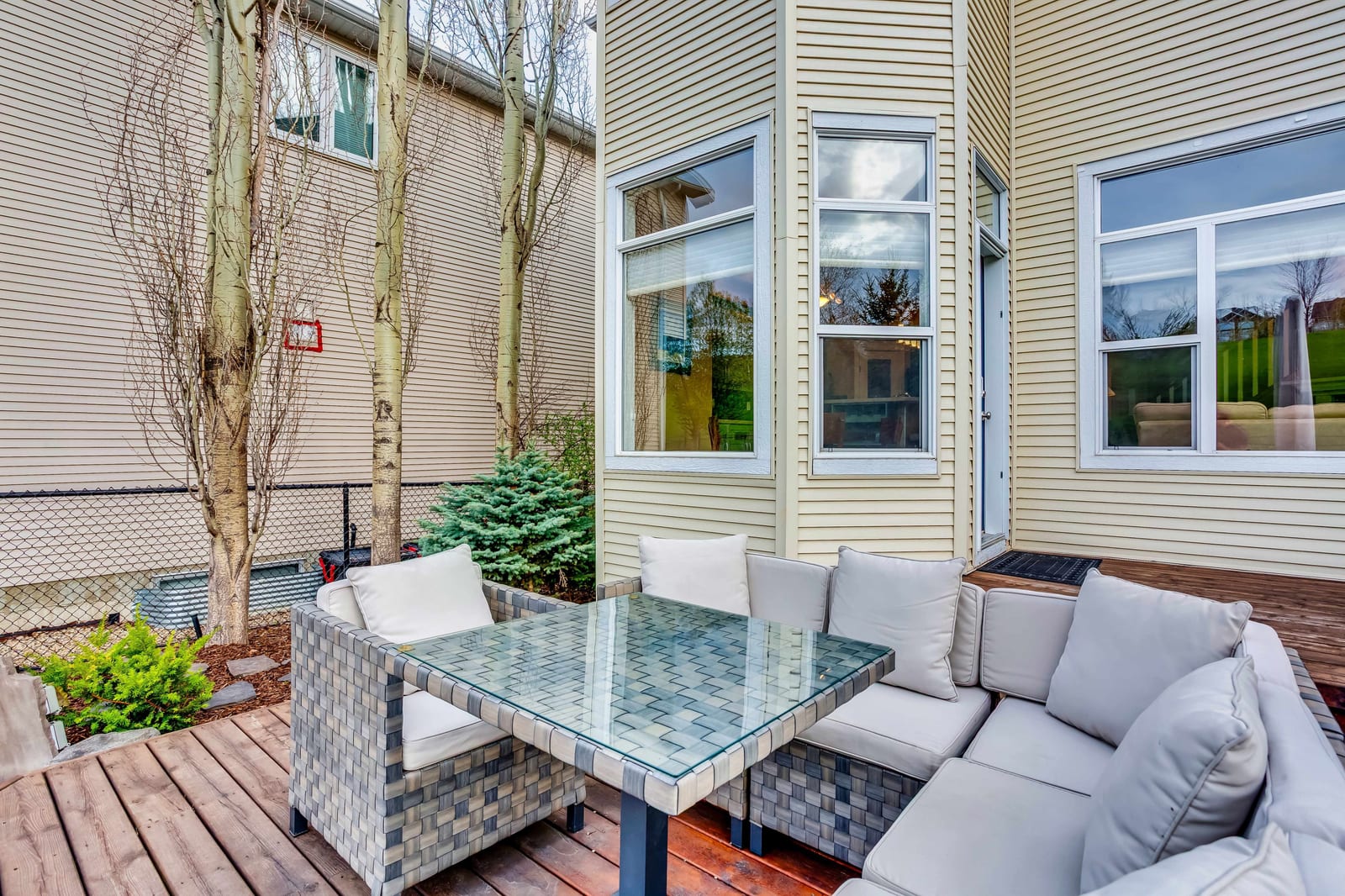 Deck seating beside the home