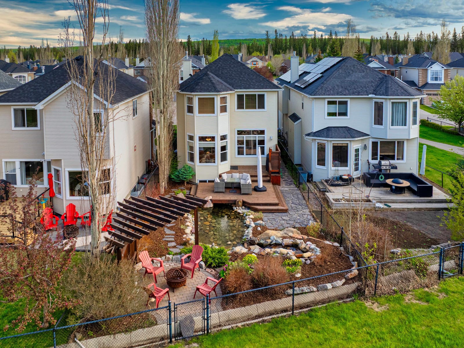 Rear aerial showing deck and garden