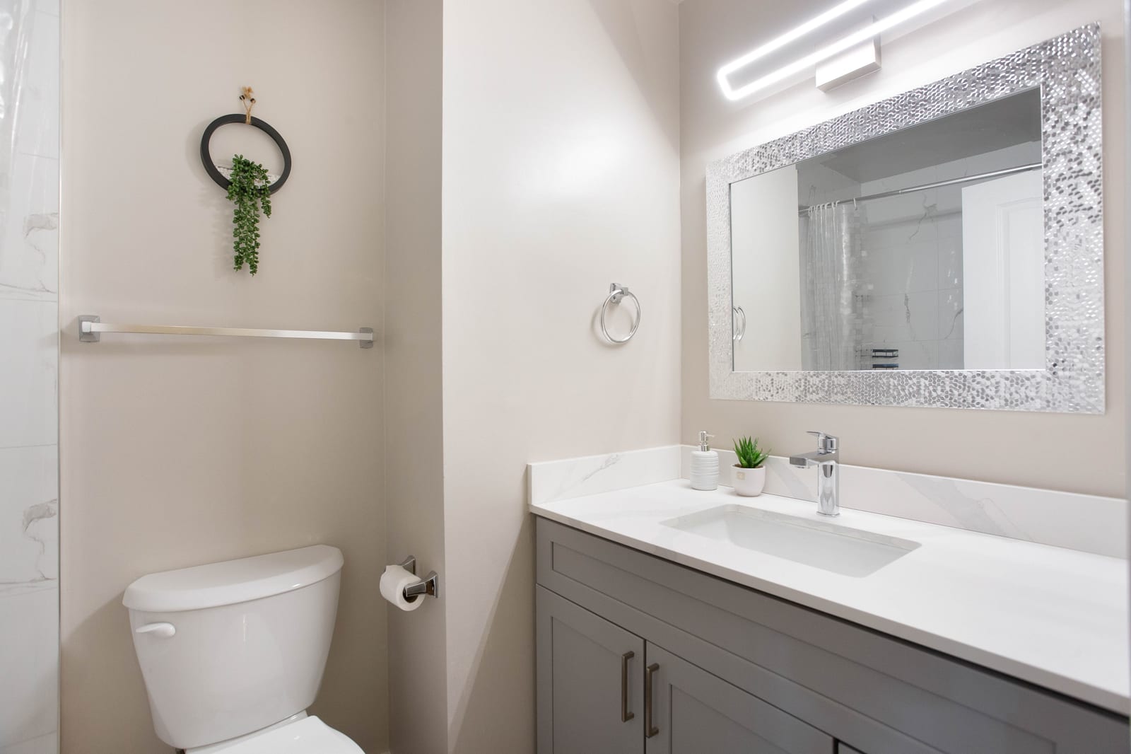 Bathroom vanity and toilet