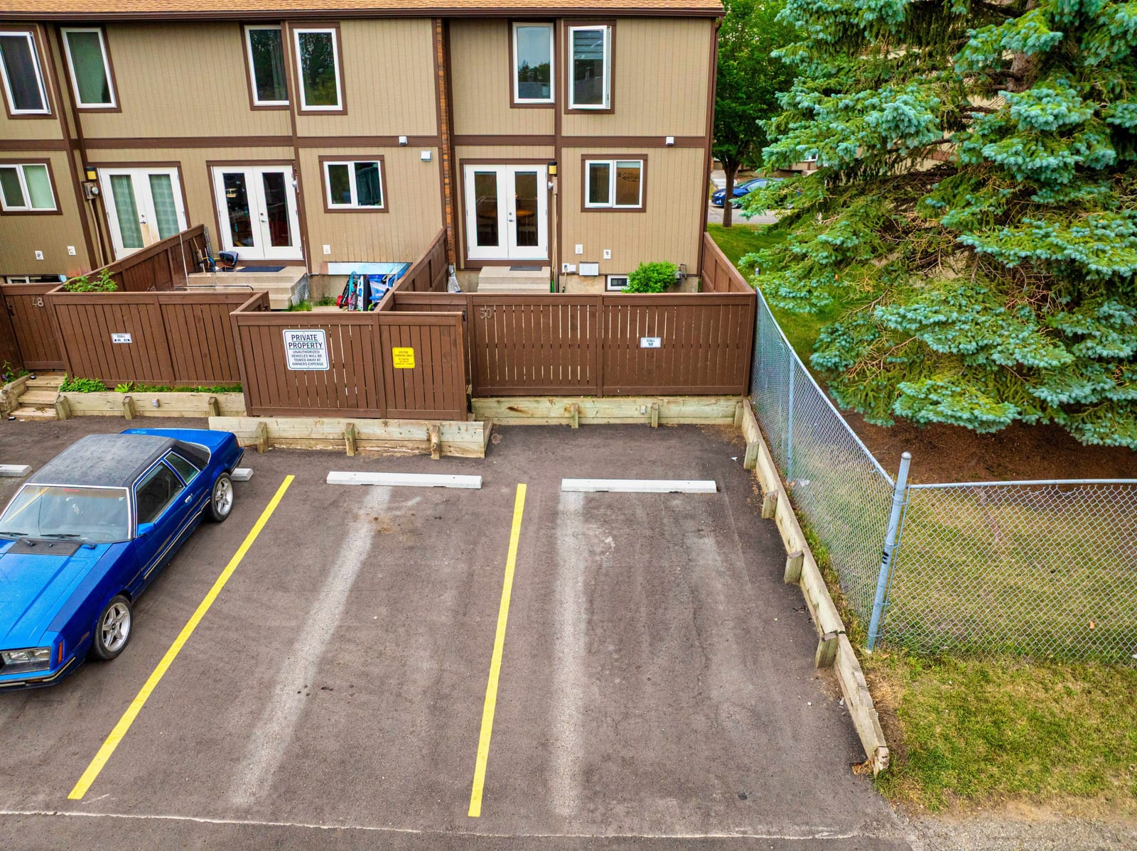 Elevated view of parking and rear exterior