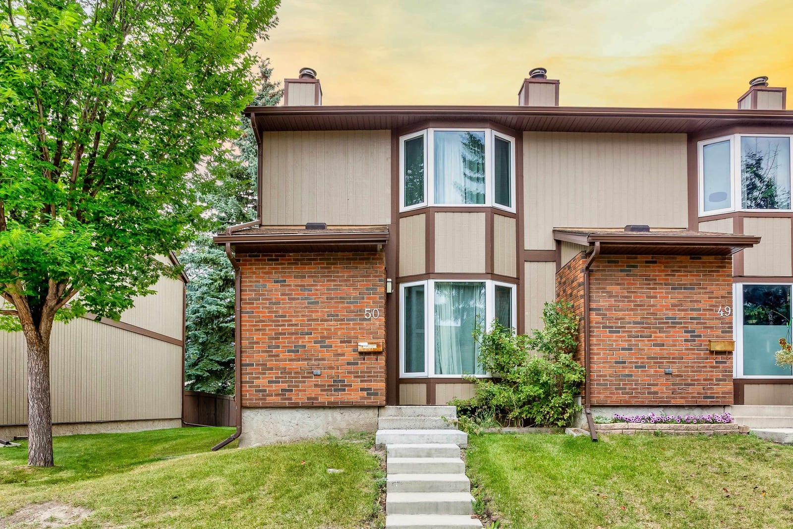 Front exterior and walkway to the townhome