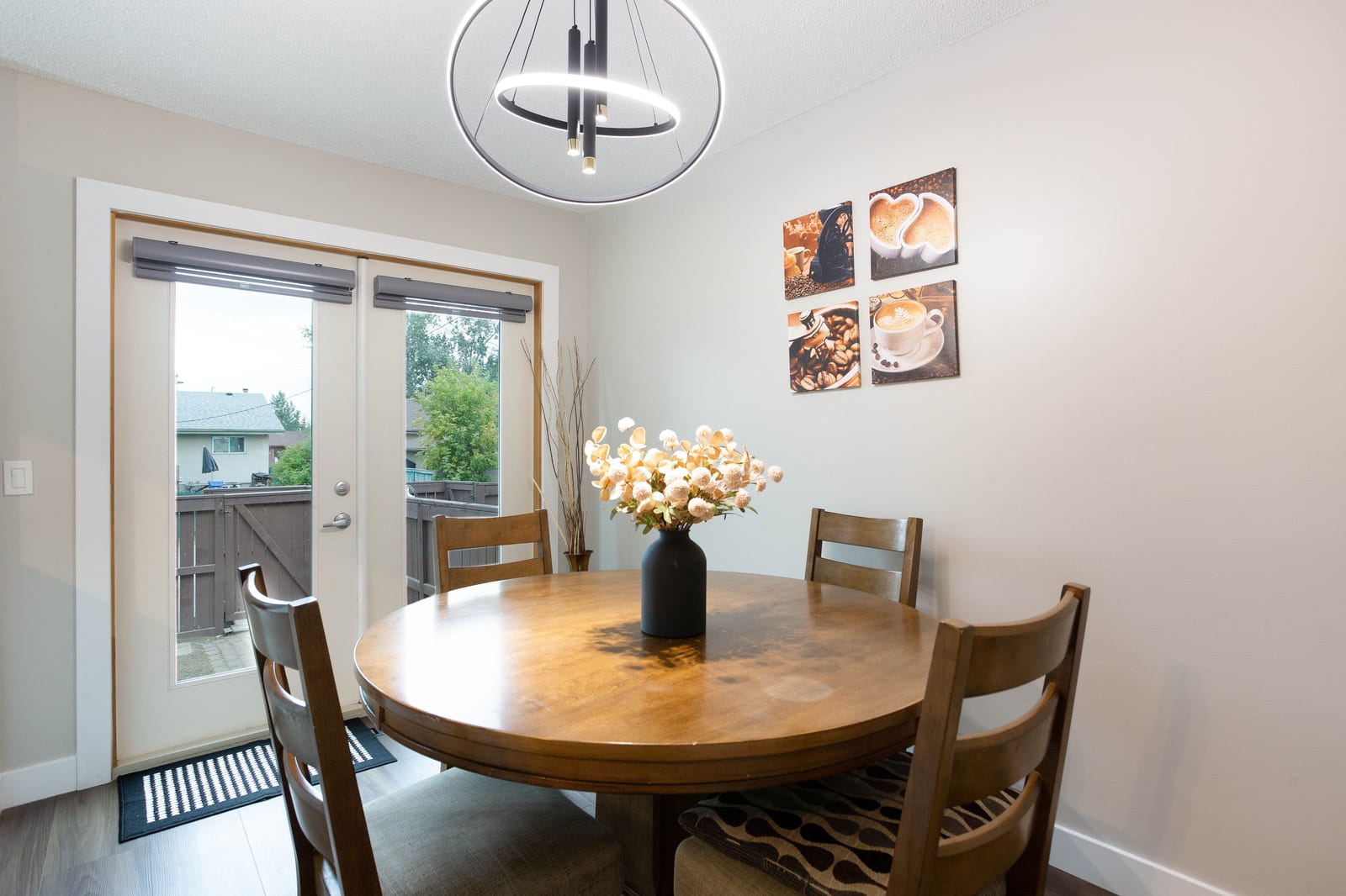 Dining area beside glazed backyard doors