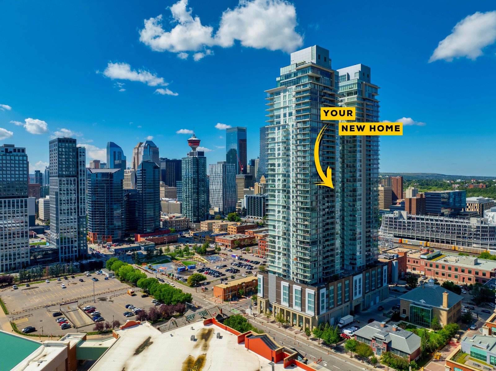 Aerial view of The Guardian towers and Calgary skyline, with listing location marker