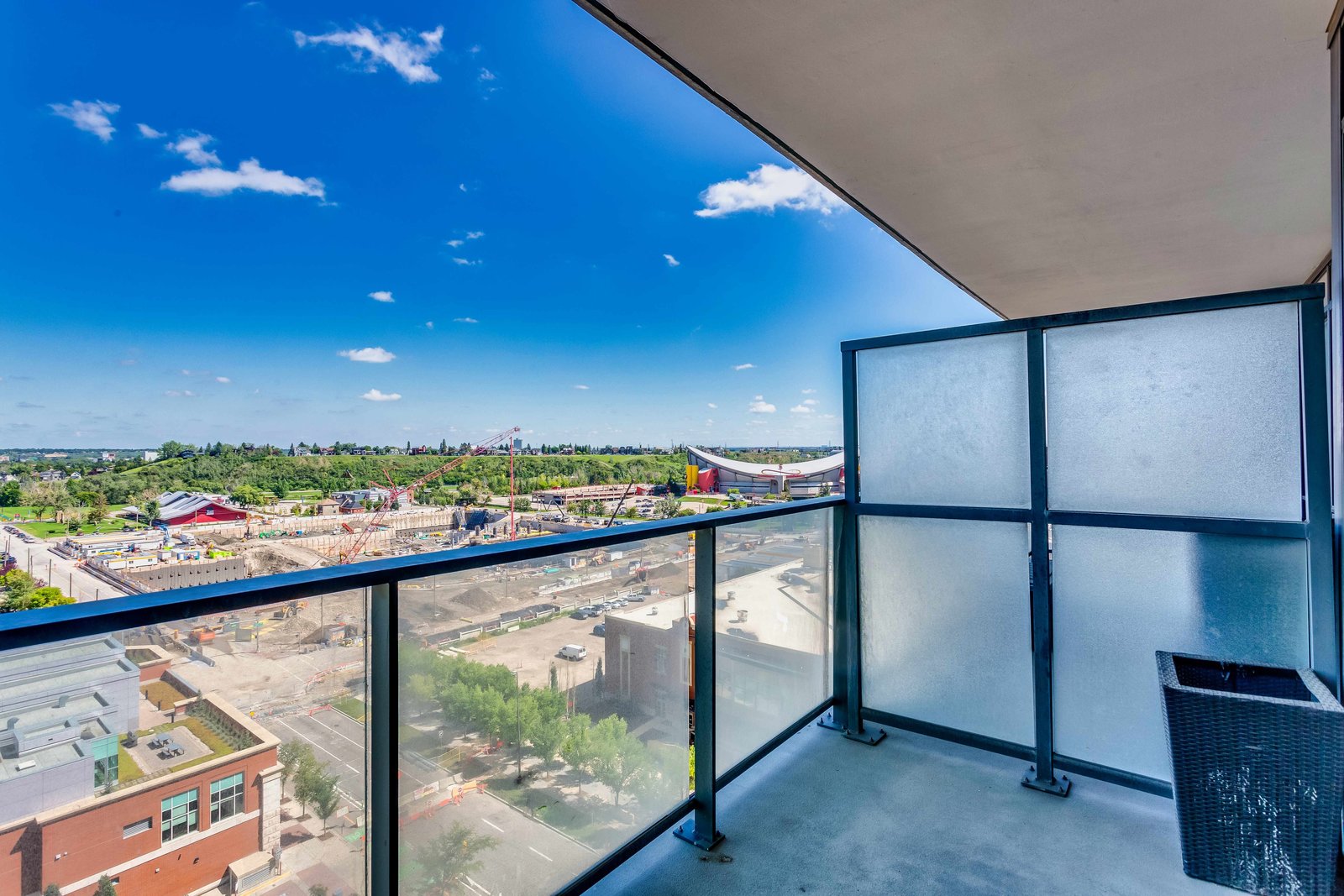 Covered balcony with glass railing