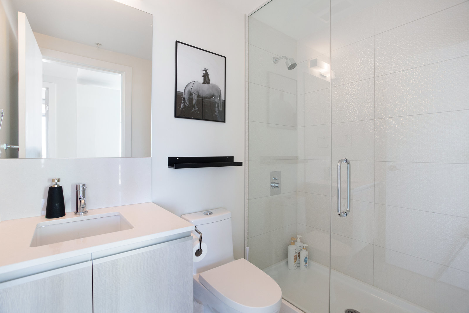 Bathroom vanity and illuminated mirror