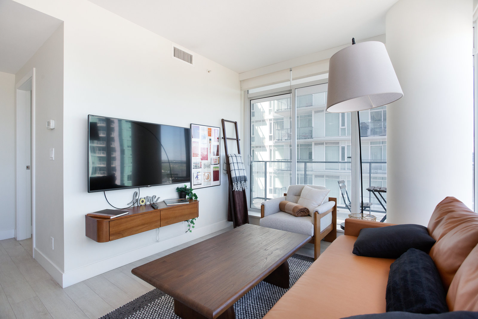 Living room with wall-mounted television