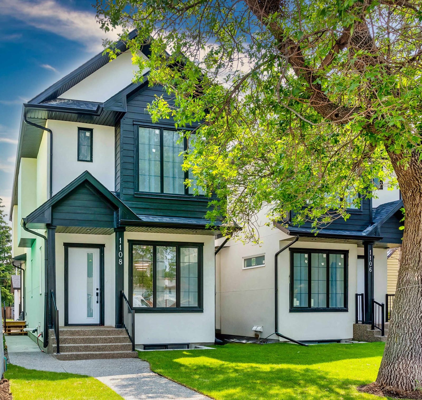 Front exterior of the paired Renfrew homes — 1108 6 Street NE, Renfrew