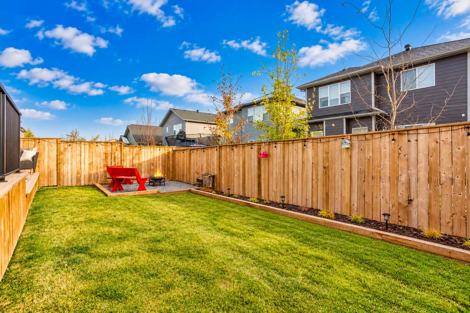 Fenced backyard lawn — 809 Mandalay Link