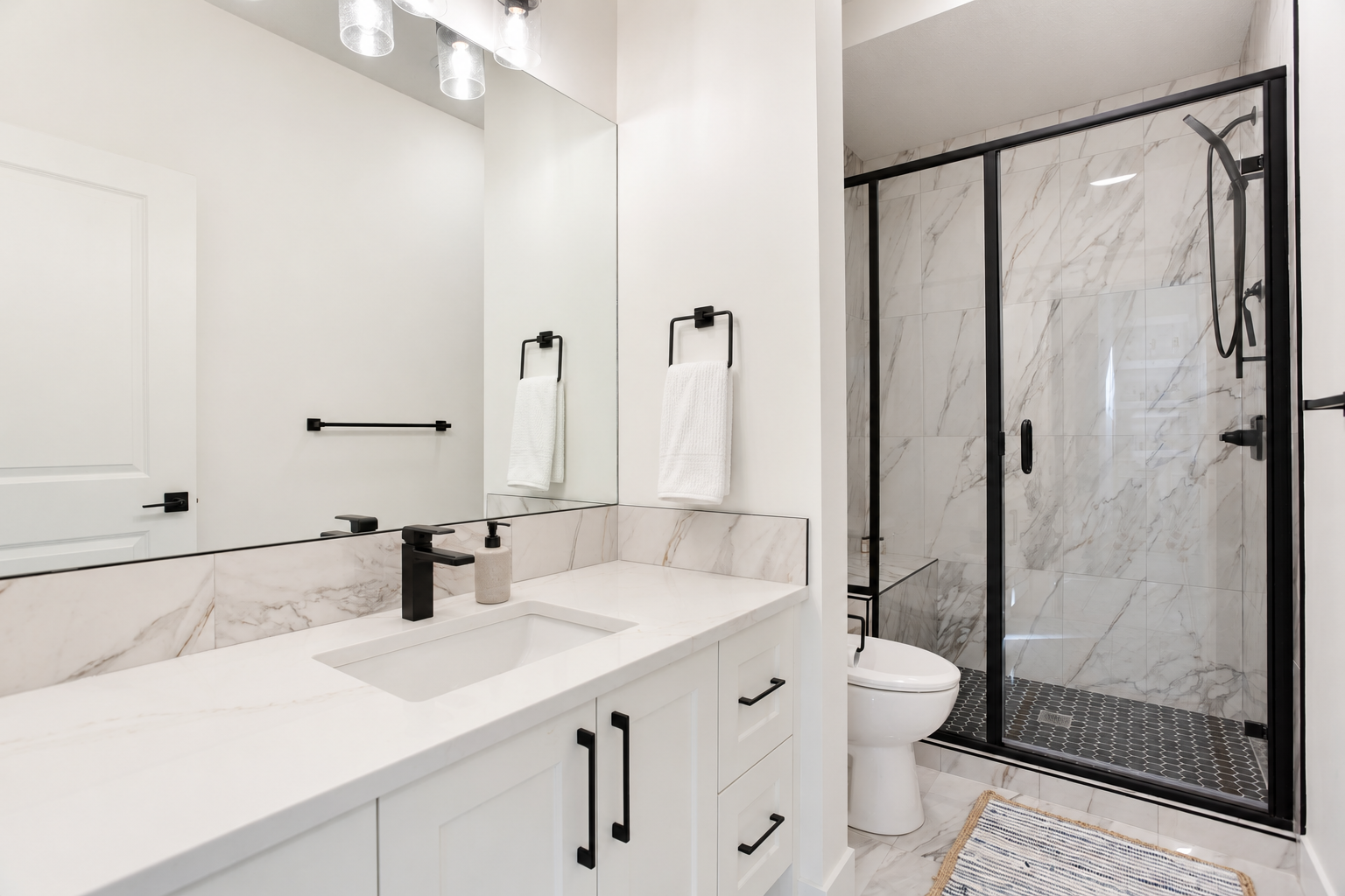 Basement bathroom with glass shower — 809 Mandalay Link