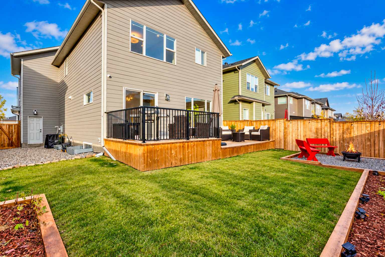 Rear exterior with deck and backyard — 809 Mandalay Link