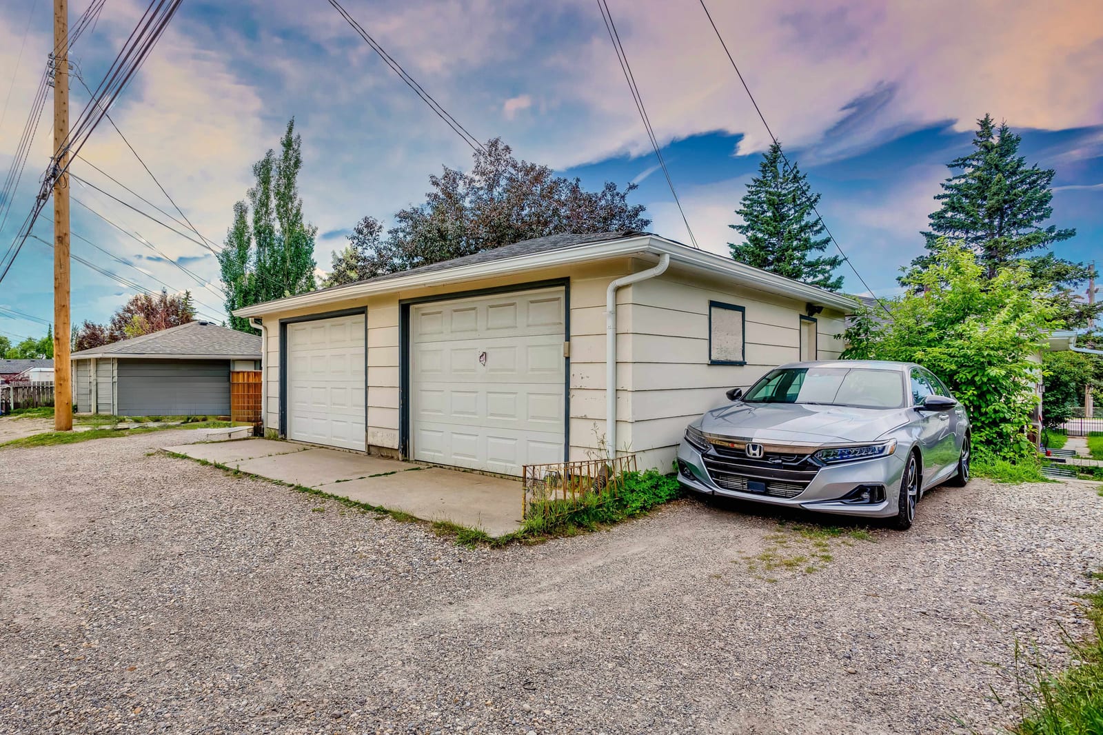 Detached double garage and parking