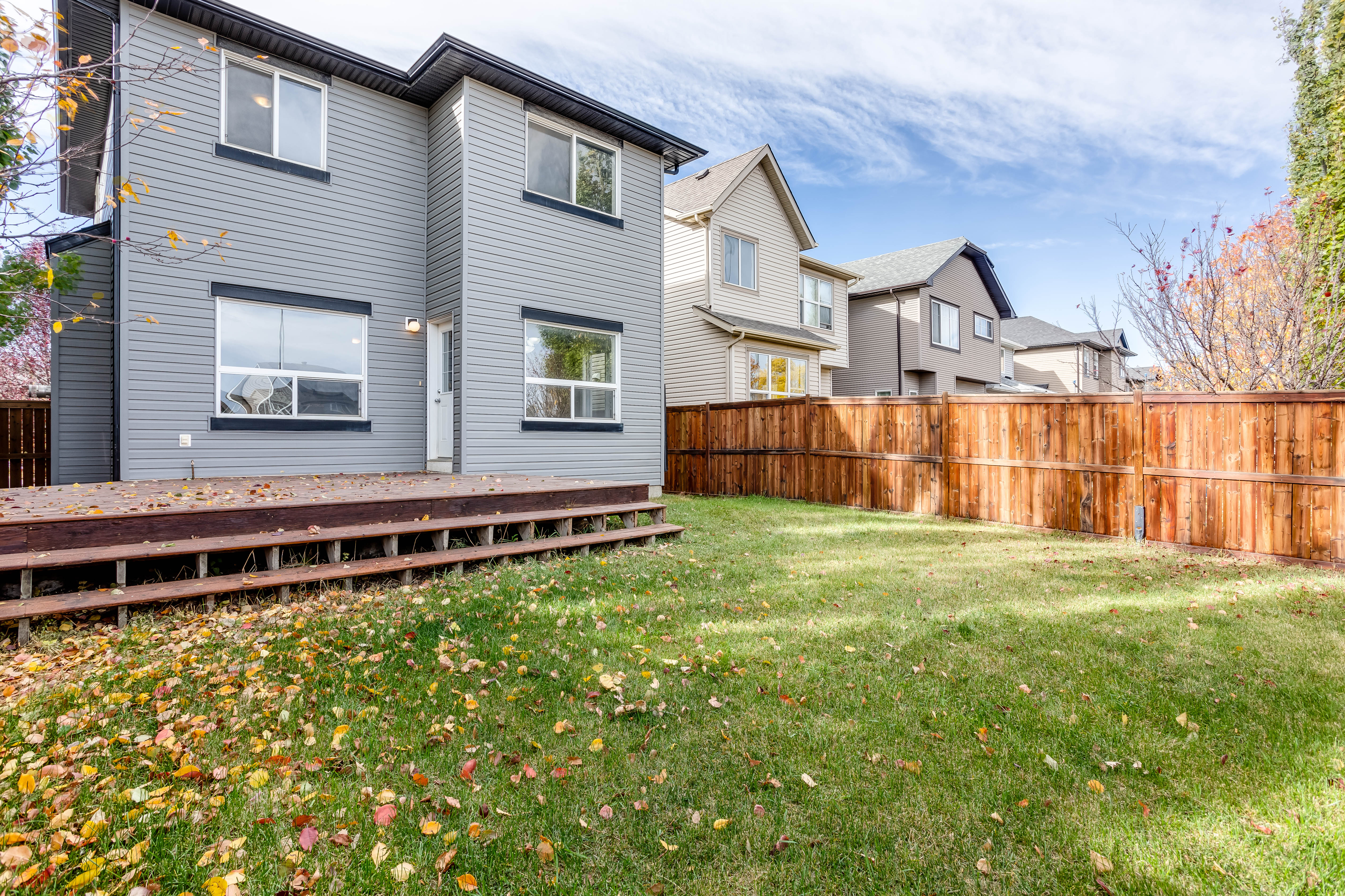 Rear patio doors and deck — 119 Sage Hill Green NW