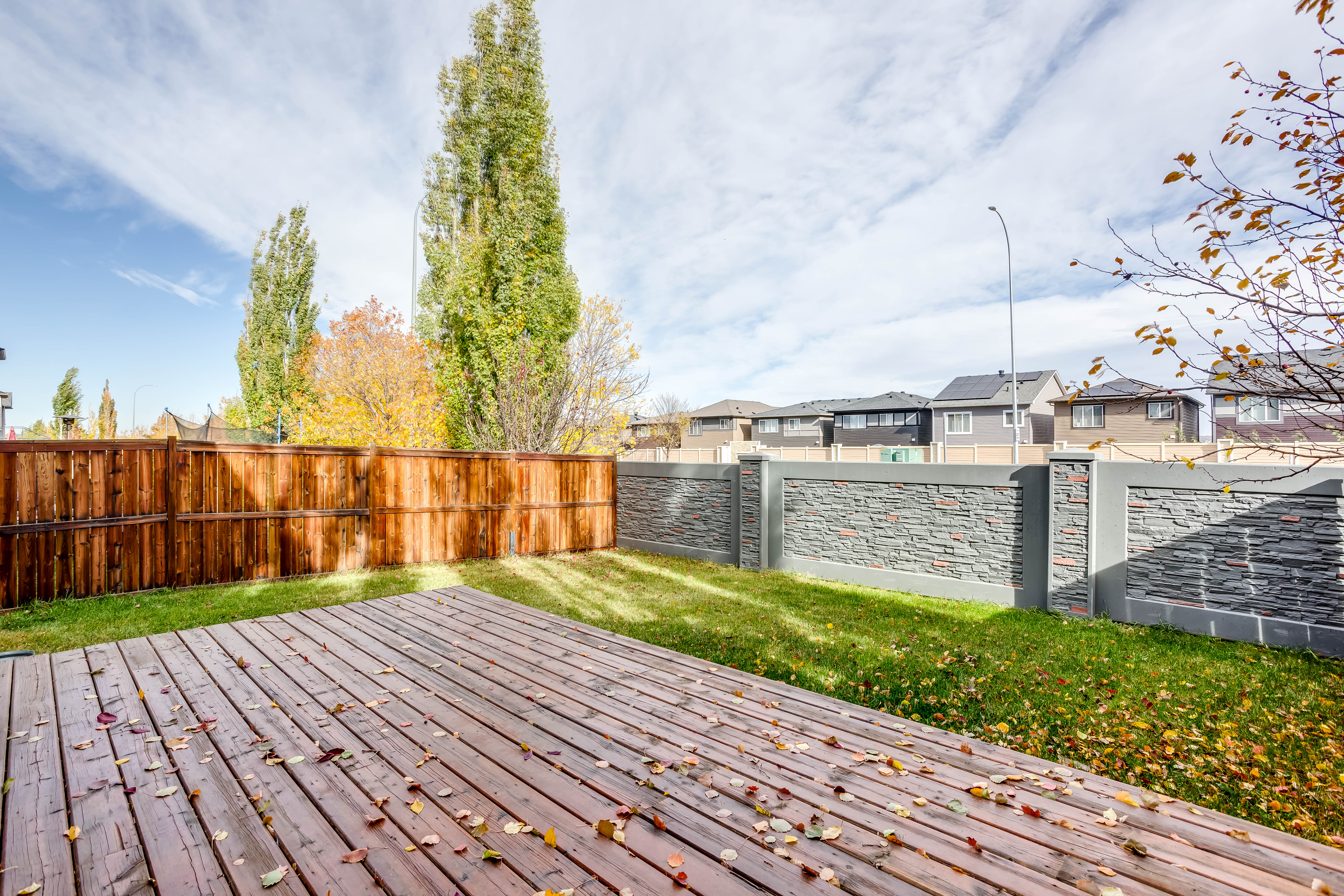 Raised deck overlooking the yard — 119 Sage Hill Green NW