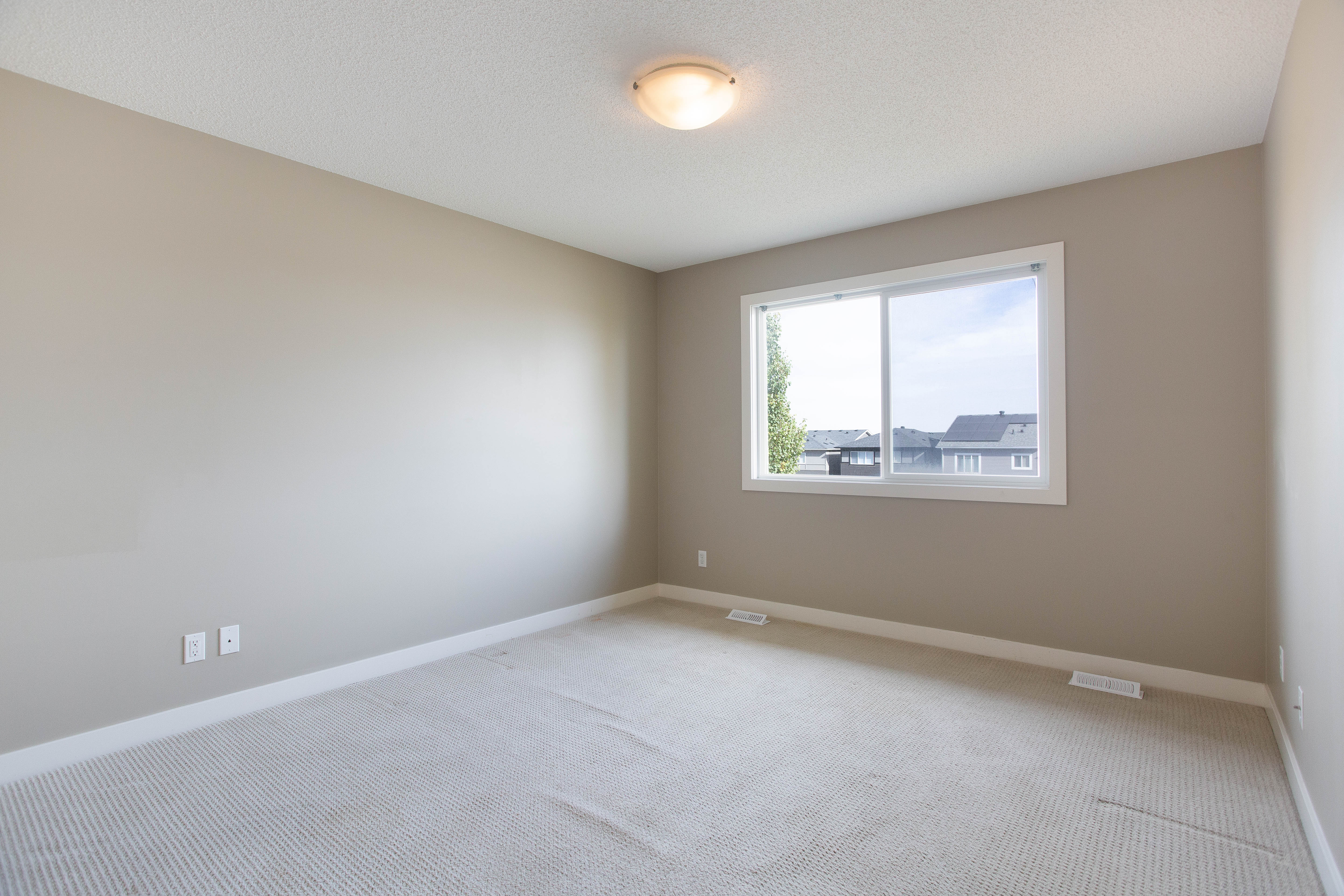 Upstairs bedroom window — 119 Sage Hill Green NW