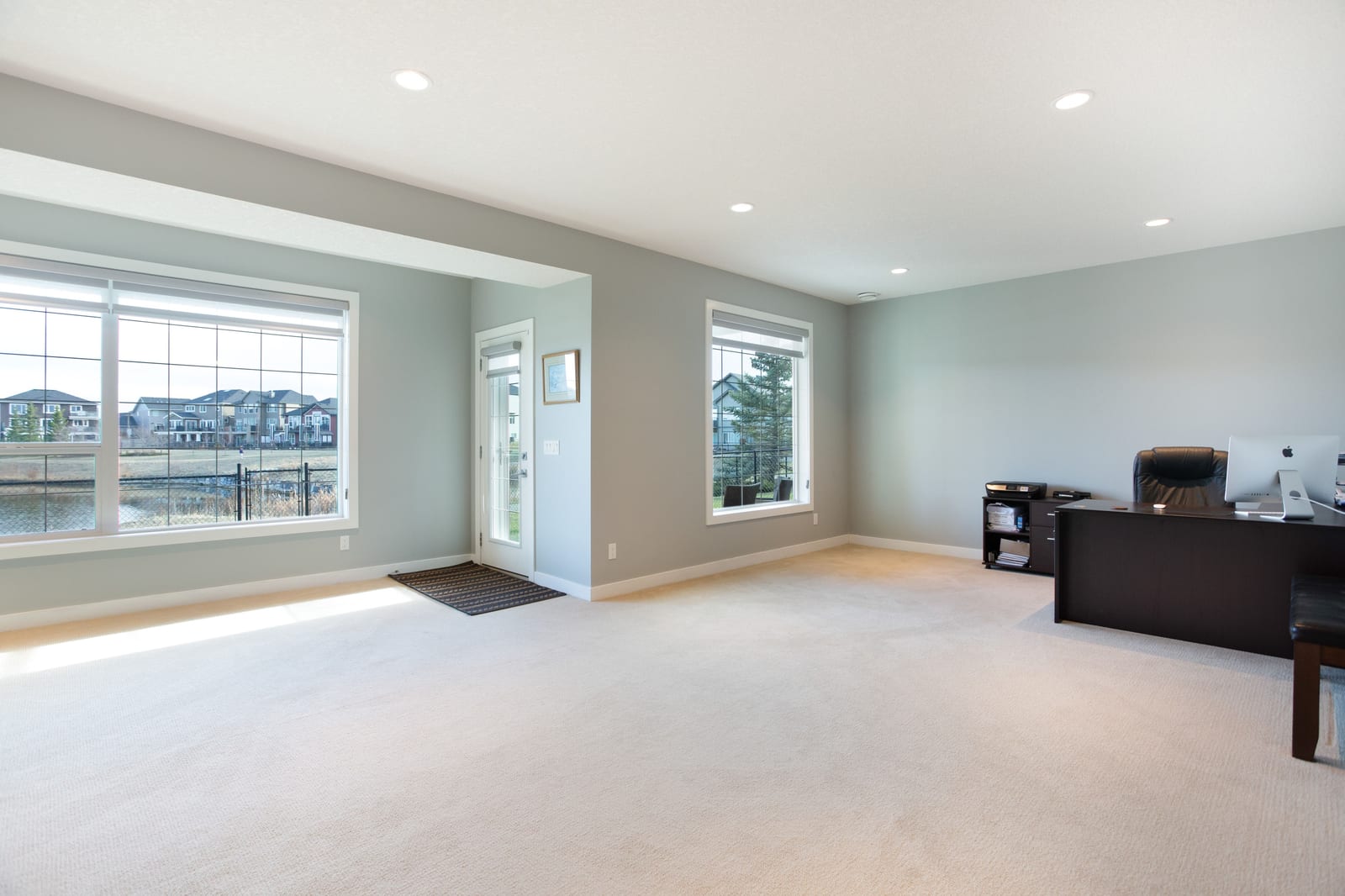 Walkout recreation room and broad windows