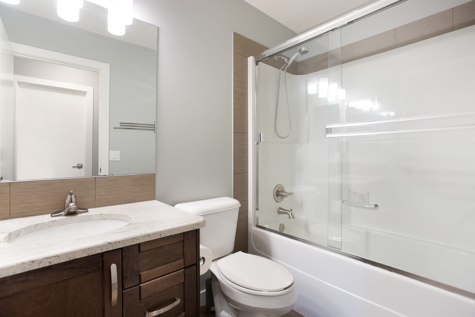 Main-floor bathroom vanity and tub