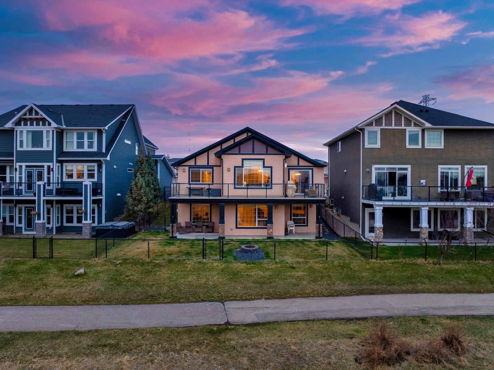 Twilight rear exterior beside pond