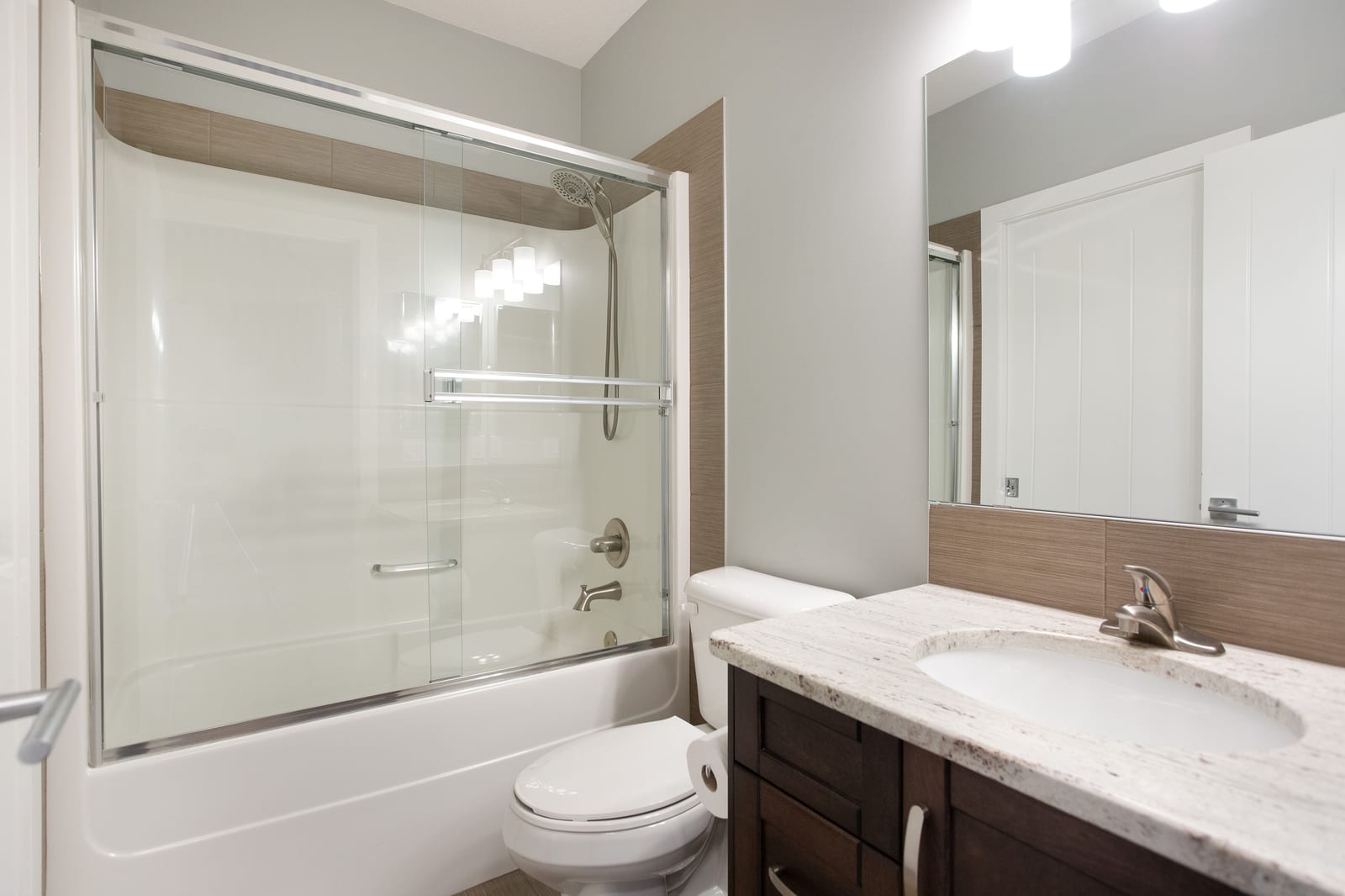 Lower-level bathroom vanity and tub