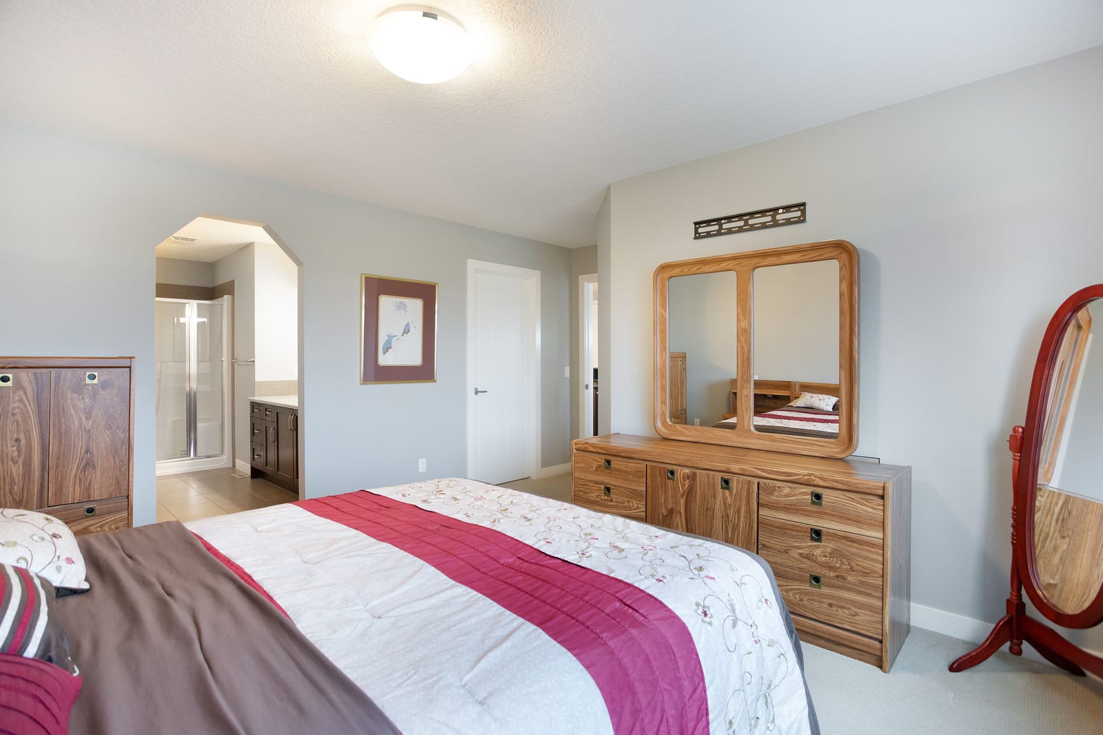 Bedroom looking toward ensuite and hallway