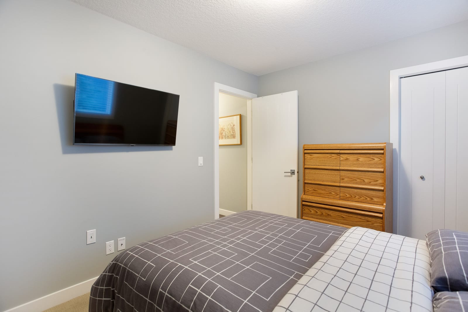 Main-floor bedroom and adjoining bathroom doorway