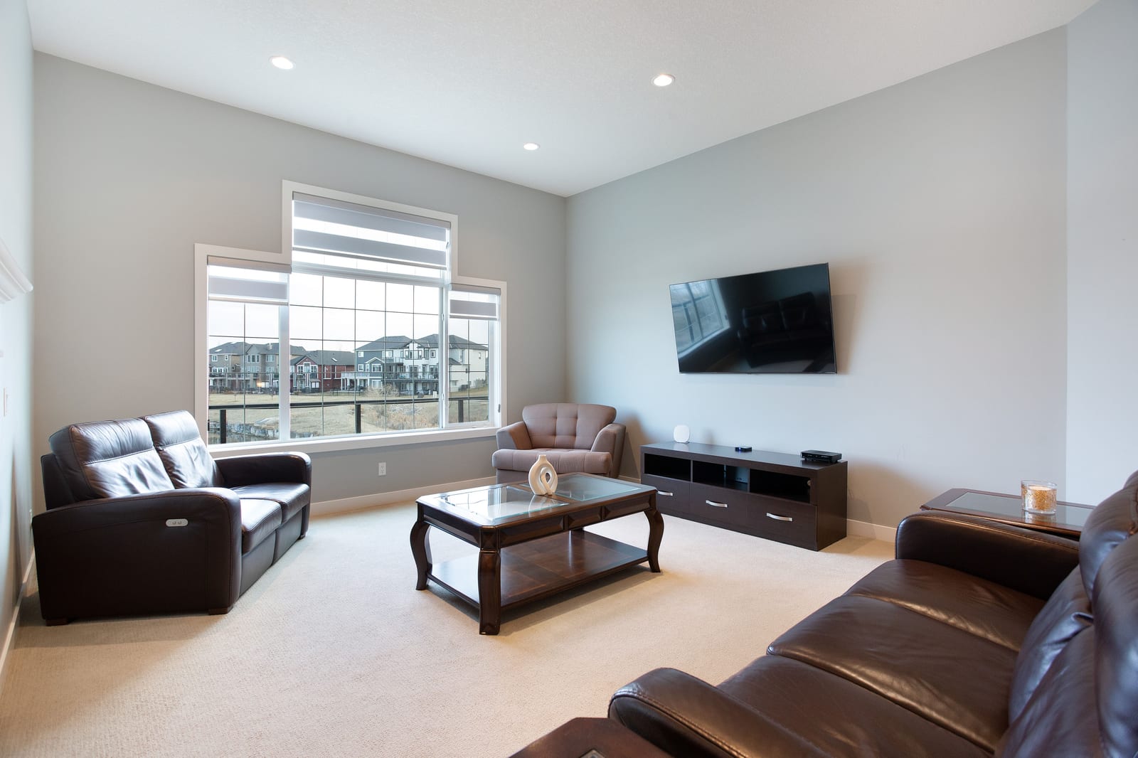 Main living room with broad pond-facing window