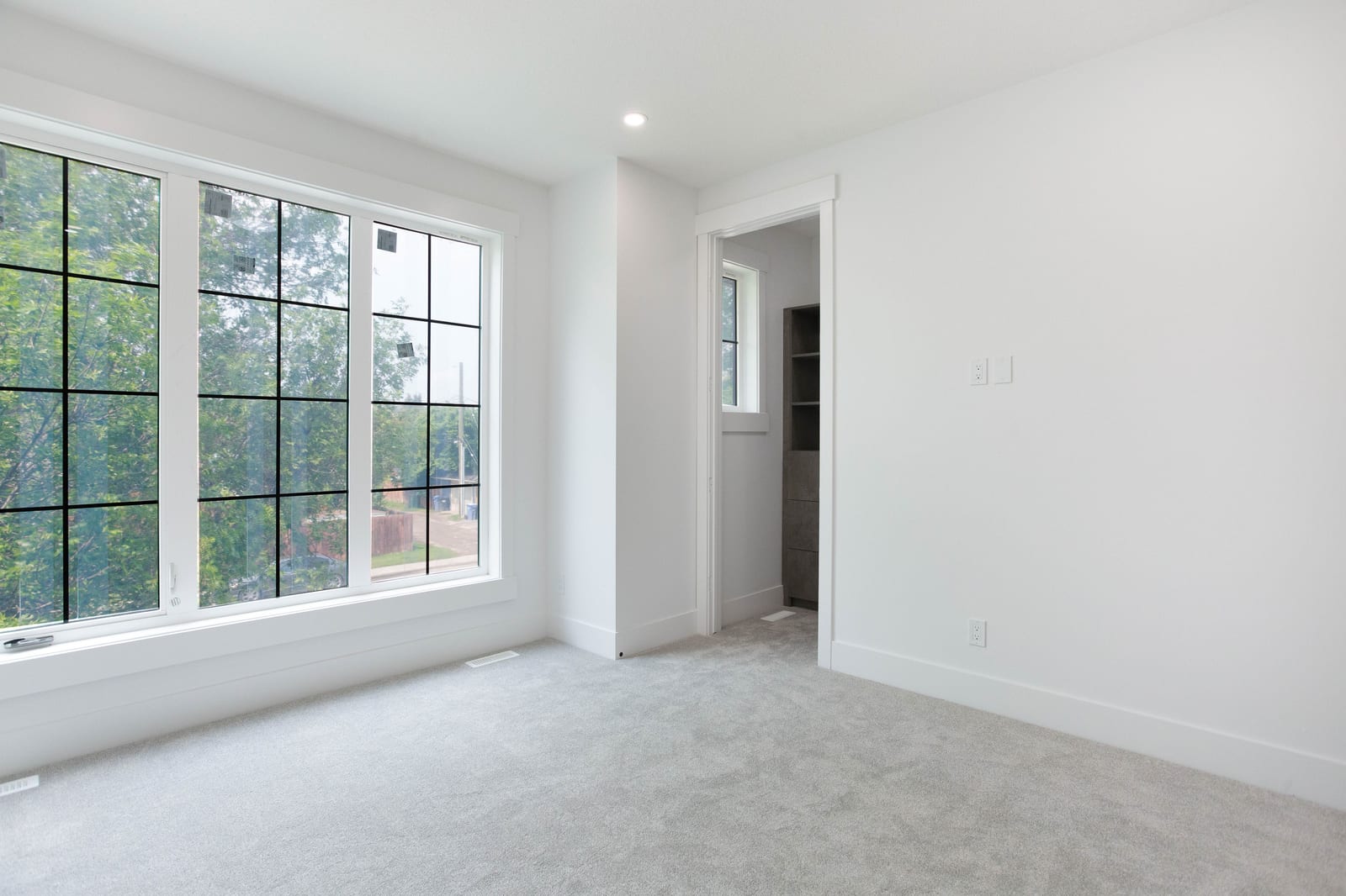 Unfurnished bedroom with large window — supplied paired-home gallery; confirm 1106 finishes