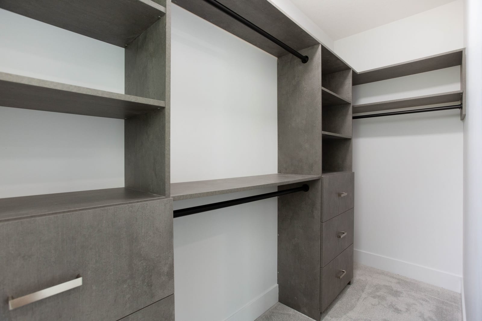 Walk-in closet with built-in shelving — supplied paired-home gallery; confirm 1106 finishes